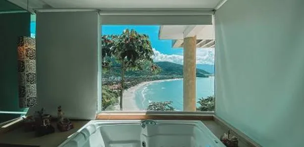 Casa de Condomínio com 4 Quartos para venda ou aluguel, 600m² no Toninhas, Ubatuba
