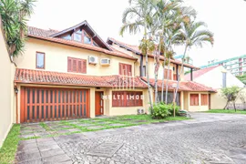 Casa de Condomínio com 4 Quartos para alugar, 386m² no Petrópolis, Porto Alegre - Foto 1