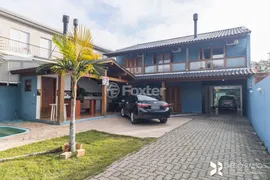Casa com 4 Quartos à venda, 304m² no Vila Nova, Porto Alegre - Foto 2