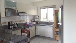 Casa de Condomínio com 2 Quartos à venda, 59m² no Rondônia, Novo Hamburgo - Foto 1