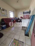 Casa com 3 Quartos à venda, 150m² no Segismundo Pereira, Uberlândia - Foto 1