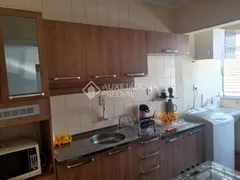 Apartamento com 2 Quartos à venda, 59m² no Jardim Lindóia, Porto Alegre - Foto 1