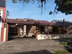 Casa com 6 Quartos à venda, 290m² no Santa Maria Goretti, Porto Alegre - Foto 1