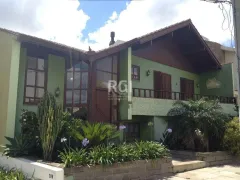 Casa de Condomínio com 4 Quartos à venda, 350m² no Nonoai, Porto Alegre - Foto 1