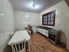 Casa com 4 Quartos à venda, 168m² no Jardim Aruã, Caraguatatuba - Foto 10