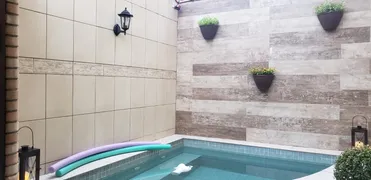 Sobrado com 3 Quartos à venda, 140m² no Jardim Helena Maria, Guarujá - Foto 27