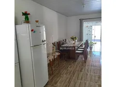 Casa com 3 Quartos à venda, 150m² no Mansorur, Uberlândia - Foto 2