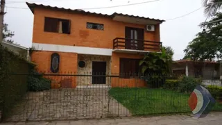 Casa com 3 Quartos à venda, 235m² no Guarujá, Porto Alegre - Foto 1