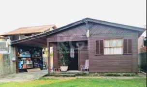 Casa com 2 Quartos à venda, 53m² no Vila Nova, Porto Alegre - Foto 1