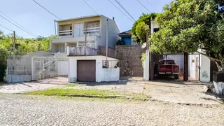 Casa com 1 Quarto à venda, 150m² no Santo Antônio, Porto Alegre - Foto 32