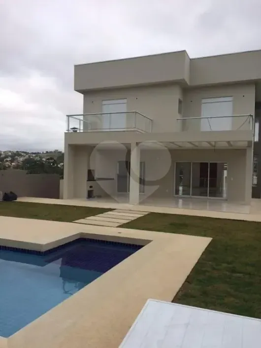 Foto do imóvel - Casa de condomínio à venda com 4 quartos, 4 suítes, 6 banheiros e 6 vagas na garagem em