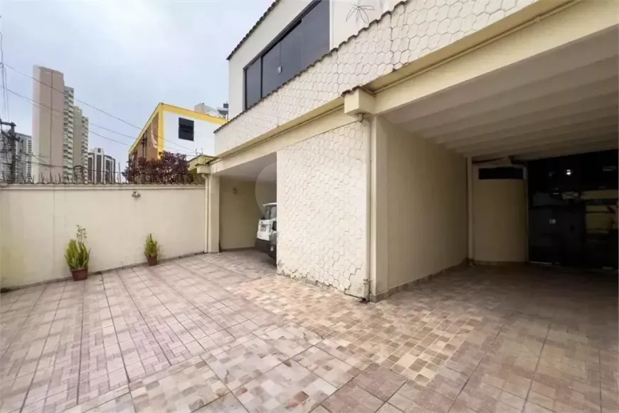 Foto do imóvel - Sobrado para alugar com 5 quartos, 2 suítes, 6 banheiros e 5 vagas, próximo ao Metrô Santos.