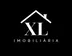 Miniatura da foto de Xl Imobiliária