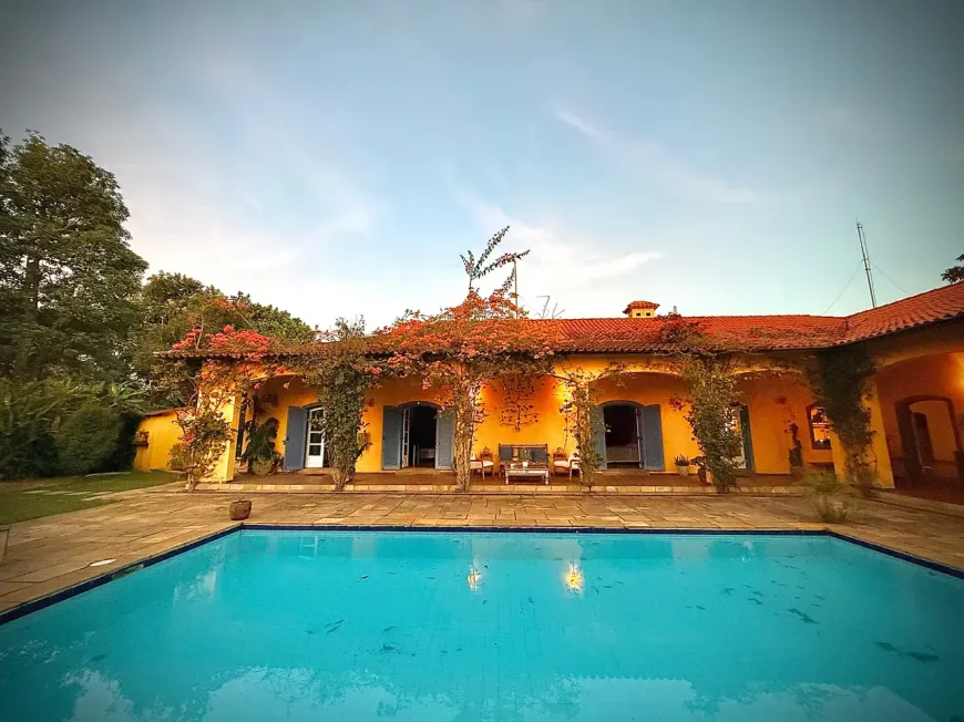 Foto do imóvel - Casa condomínio à venda com 6 quartos, 4 suítes, 5 banheiros, 4 vagas na garagem e 600 m² em