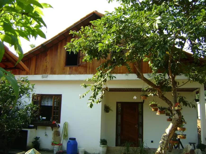 Foto do imóvel - Casa à venda com 2 quartos, sendo 1 suíte, 3 banheiros, 4 vagas e condomínio com piscina em
