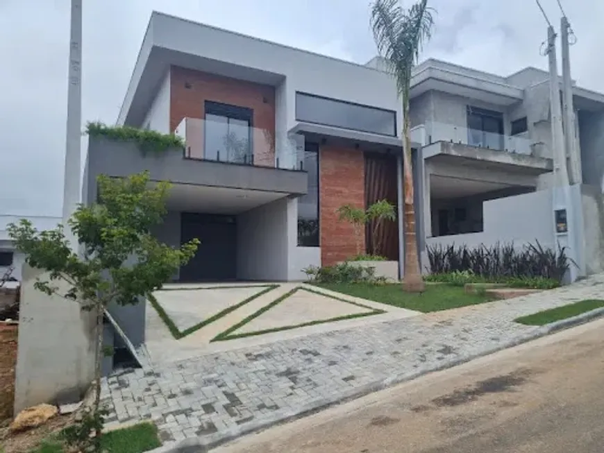 Foto do imóvel - Casa de condomínio à venda com 3 quartos, 3 suítes, 202 m², 5 banheiros e 4 vagas na garagem em